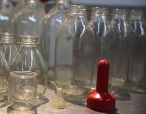 dairy jars bottles in glass